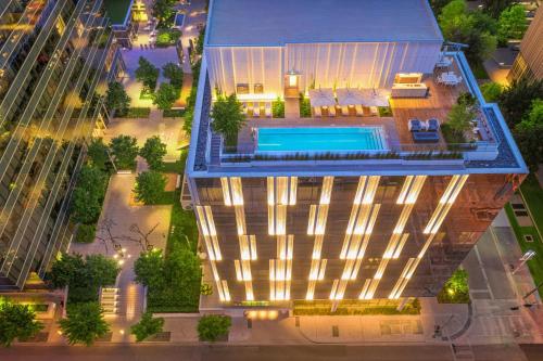 an overhead view of a building with a swimming pool at HALL Arts Hotel, Dallas, Autograph Collection in Dallas