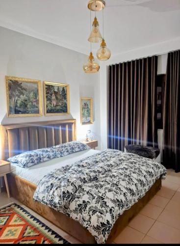Panoramic apartment tesisinde bir odada yatak veya yataklar