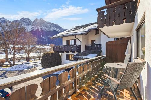 a balcony with a view of the mountains at Gaestehaus Florian - Ferienwohnungen in Grainau