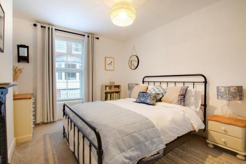 a bedroom with a bed and a large window at 2 Bed in Cromer oc-t29986 in Cromer