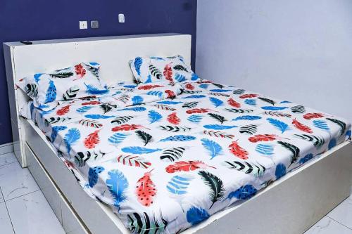 Llit o llits en una habitació de Résidence Obed