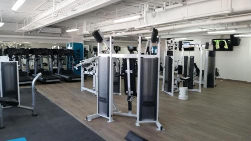 a gym with rows of treadmills and machines at Hotel Ticuán in Tijuana