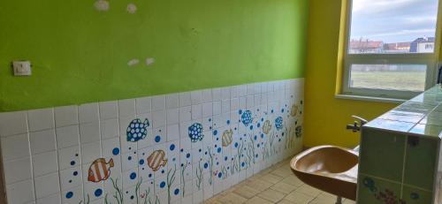 a bathroom with a sink and a toilet at turistická ubytovňa LIENKA in Holíč
