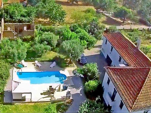 an aerial view of a house with a swimming pool at Luxury Private apartment FREE Play Park inc QUID BIKES PRIVATE Heated swimming pool