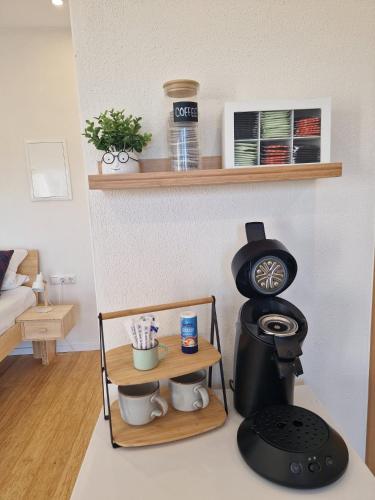a kitchen with a coffee maker on a counter at Ferienwohnung Weitblick Wiese in Neusitz