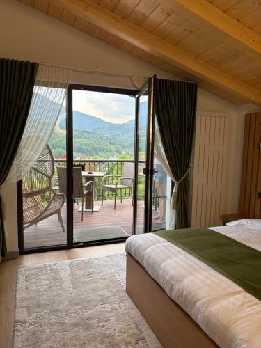 Postel nebo postele na pokoji v ubytování Liniștea Codrului