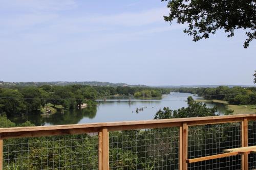 a view of the river from the deck at Guadalupe Bluff Farmhouse in Kerrville