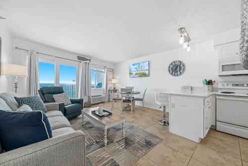a living room with a couch and a table at Perdido Skye 64 in Pensacola