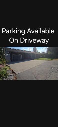 a picture of a parking available on a driveway at Private Entrance OFFICE SPACE King Suite in Mission City
