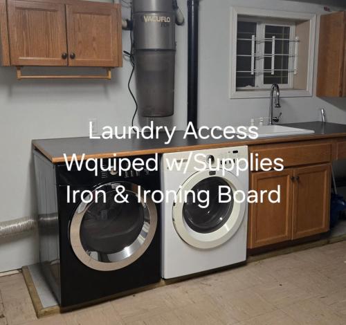a washer and dryer in a kitchen with the words laundry access renovated my at Private Entrance OFFICE SPACE King Suite in Mission City