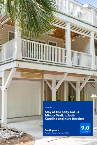 a house with a sign in front of it at Stay at The Salty Gal - 4 Minute Walk to both Carolina and Kure Beaches in Carolina Beach