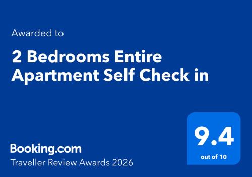 a blue sign that reads bedrooms entire apartment self check in at 2 Bedrooms Entire Apartment Self Check in in Fife