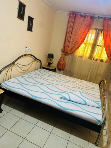 COSY House tesisinde bir odada yatak veya yataklar