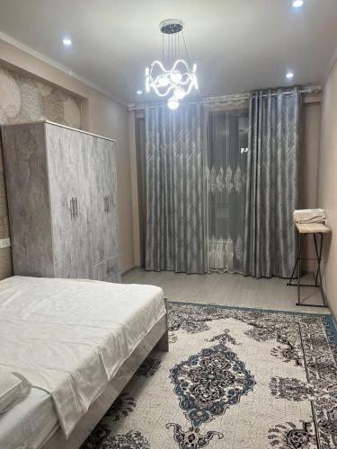 Llit o llits en una habitació de Квартира