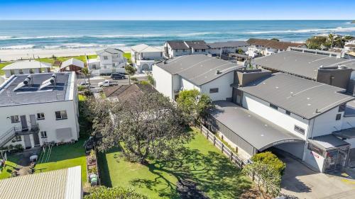 an aerial view of houses and the beach at Lennox Beach Shack in Lennox Head