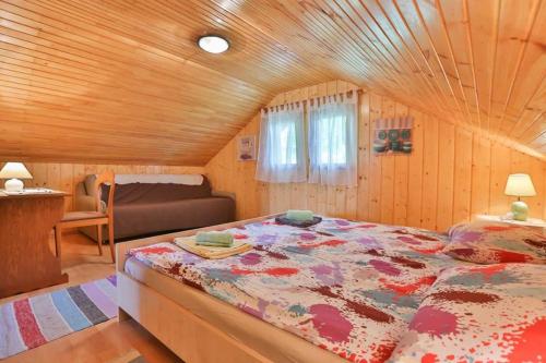 Postel nebo postele na pokoji v ubytování Holiday Home Tržan