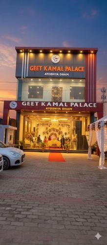 a store front with a car parked in front of it at GeetKamal Palace Ayodhya Dham in Ayodhya