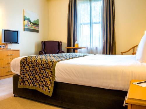 Postel nebo postele na pokoji v ubytování Great National Hotel Ballina