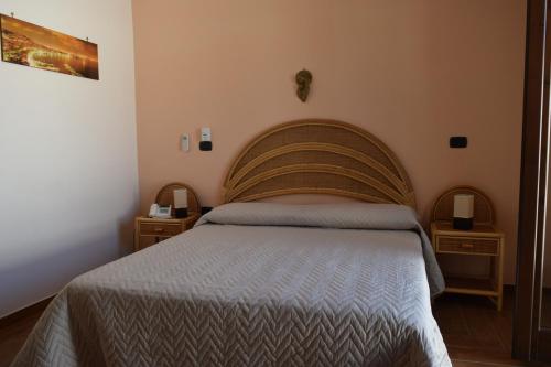 Ένα ή περισσότερα κρεβάτια σε δωμάτιο στο Bed &Breakfast Pinetamare
