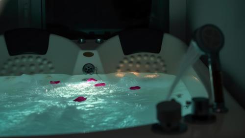 a table with hearts on it in a room at Gyeongju Modern Pool Villa in Gyeongju