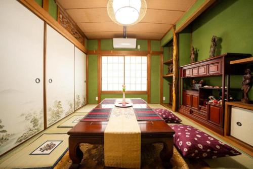 3-story building airport bus direct access JR Namba Station Kintetsu subway Shinsaibashi Dotonbori within walking distance
