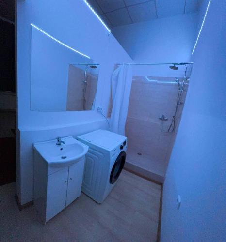 En eller flere senge i et værelse på Apartmán KORUNKA