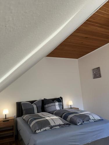 a bedroom with a bed in a attic at Bückeburg Living in Bückeburg