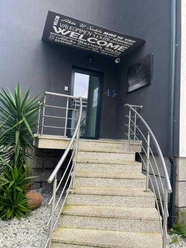 a set of stairs leading up to a door at In Barcelos View Lodge in Barcelos