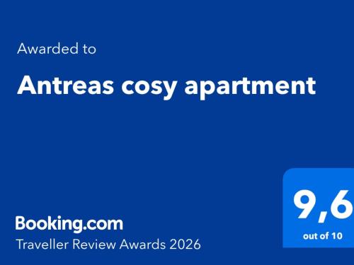 a blue sign with the words americas cosy appointment at Antreas cosy apartment in Paralio Astros