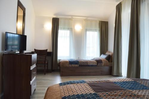 Katil atau katil-katil dalam bilik di Villa Borika