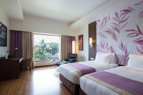 Gallery image of Purple Palms Resort & Spa in Kushālnagar