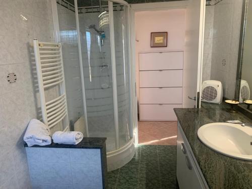 a bathroom with a shower and a sink at Riserva Verde in Castel Porziano