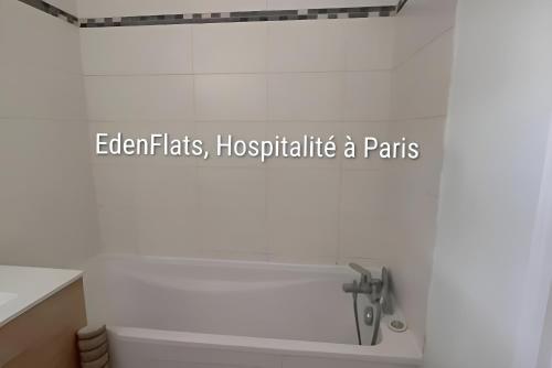 a bathroom with a sink with the words elephant fats hospitalittleittle a pens at Citronnelle, 2 Chambres, 3 min Métro 8 in Maisons-Alfort