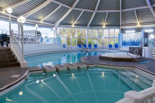 a large swimming pool with a large pool at Royal Bath Hotel Bournemouth in Bournemouth