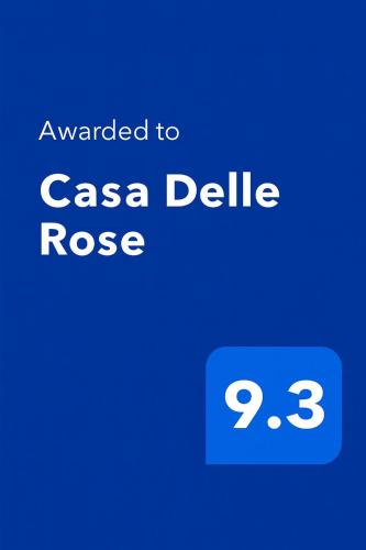 a screenshot of a cell phone with the text awarded to casa delle rose at Casa delle Rose Terrazza vista mare panoramica e relax a Cala Gonnone, WiFi, AC in Cala Gonone
