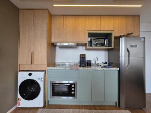 Dapur atau dapur kecil di Loft Cama Queen - Eztower e Consulado EUA!