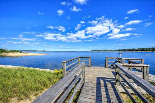a wooden bridge over a body of water at Great location with Water Views in Harwich