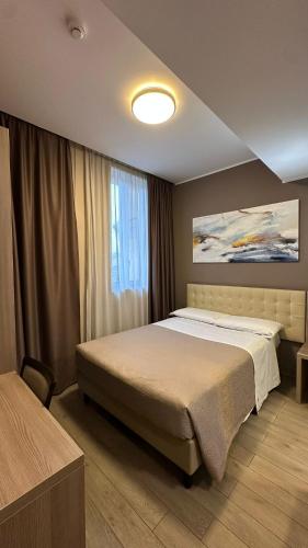 Llit o llits en una habitació de Hotel Folen