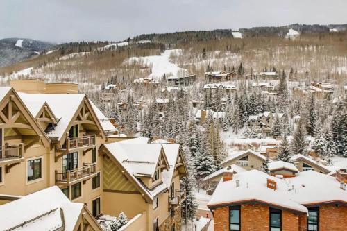 arial view of a resort in the snow at Modern Vail Village Mountain View Residence in Vail