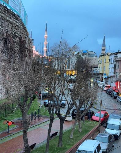 a view of a city with cars parked in a parking lot at Blue Mosque Suites 2 - Old City Sultanahmet in Istanbul