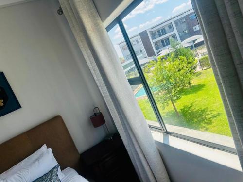 Llit o llits en una habitació de Alpha 5 Views