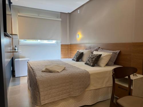 a bedroom with a large bed in a room at BALSAS PREMIER HOTEL in Balsas