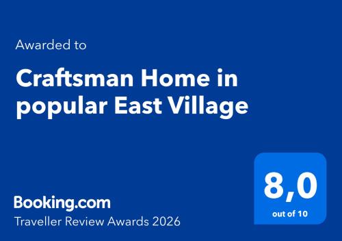 a blue sign with the words christmas home in popular east village at Craftsman Home in popular East Village in Vancouver