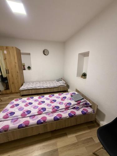 a bedroom with two beds in a room at gvero apartment’s in Prilep