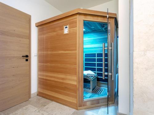 a wooden door in a room at Panorama Loft in Wörgl