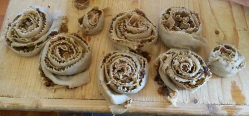 a group of pastries on a wooden cutting board at Borgo Santa Lucia in Cropani