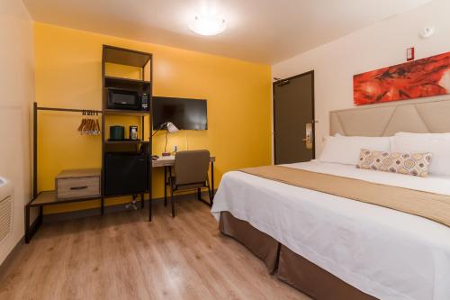 Кровать или кровати в номере Kawada Hotel