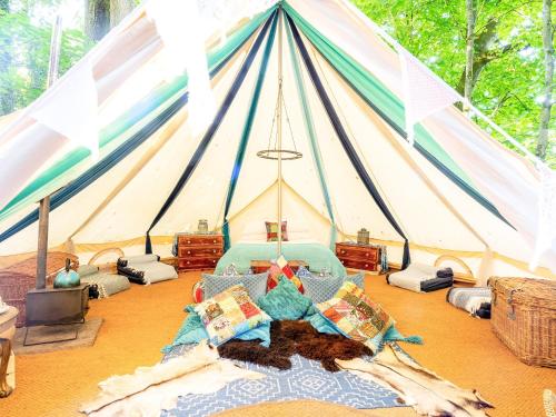 a tent with a bed in the middle of a room at Moroccan - Ukc5930 in Highclere