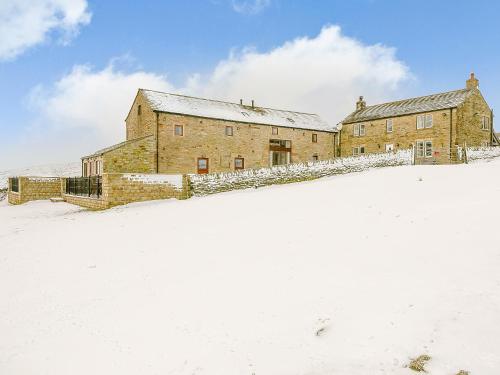 an old stone building in the snow at Shepherd's Nook - Uk32388 in Dunford Bridge