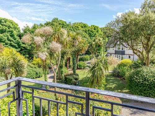 a view of a garden from a balcony at Pentreath 4 in St Ives